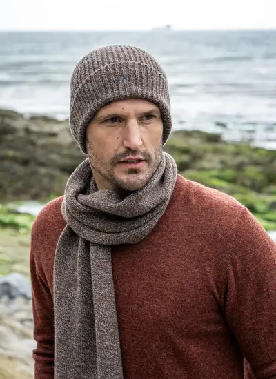 Personalized cashmere wool beanie in hazel brown, ribbed knit design, made in Ireland, worn with matching scarf